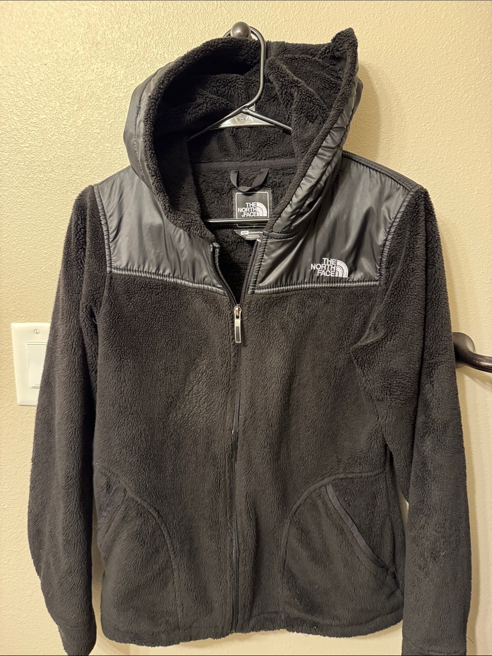 The North Face Kids Black Hooded Fleece Jacket with Nylon Shoulders